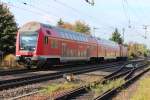 Die RB 26412 fährt am 17.10 2013 von Weißenfels nach Leipzig Hbf, hier beim passieren am Bü in Markranstädt.