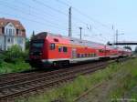 Steuerwagen der Gattung DABbuzf778 mit einem RE zwischen Greifswald Sd und dem Hauptbahnhof am 02.06.03.