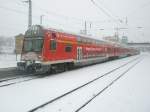 Hier ein RE7 von Bad Belzig nach Berlin Friedrichstrae, bei der Ausfahrt am 19.12.2010 aus Bad Belzig.