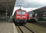 Hier links 134 641-9 mit einem RB14 von Berlin Schnefeld Flughafen nach Berlin Lichtenberg und rechts ein RE7 von Berlin Lichtenberg nach Wnsdorf-Waldstadt, diese beiden Zge standen am 18.6.2011 in