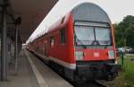 Hier RE18591  Warnemnde-Express  von Warnemnde nach Berlin Hbf.(tief), dieser Zug stand am 15.6.2013 in Warnemnde.