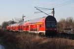 Hier ein RE3 (RE18353) von Schwedt(Oder) nach Elsterwerda, am 6.2.2014 zwischen Helbigstraße und Vierradener Chaussee in Schwedt(Oder).