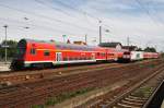 Hier ein RE3 (RE18353) von Schwedt(Oder) nach Wünsdorf-Waldstadt, bei der Ausfahrt am 17.5.2014 aus Angermünde.