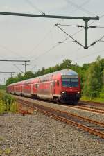 Ein RE4 Zug durch Korschenbroich ist hier zusehen auf seinem Weg nach Dortmund. 1.7.2013