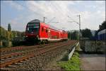 RB56 (RB 39640)  DER ISERLOHNER  geschoben von der 143 588, fhrt bei Hohenlimburg dem Ziel Hagen Hbf entgegen.