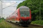 RE10417 nach Dortmund mit Schublok 111 115 an der ehem.