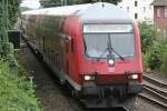 Die 111 012 schiebt den RE4 von Aachen nach Dortmund aus Geilenkirchen am 25.08.2010
