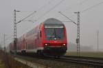 Gegen 15:22 kam dieser RB 27-Zug Steuerwagenvoraus nach Koblenz fahrend bei Gubberath Frtherhecke herangefahren, geschoben wird der Zug von der 143 835 an diesem Freitag den 15.2.2012 