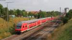 RE 19035 (Stuttgart Hbf-Singen(Htw) mit Schublok 146 210-0 in Bondorf 24.7.13