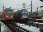 Die 1163 002 und die 101 101 am 05.01.2008 in Salzburg HBF und ein RE nach Mnchen  bei der ausfahrt aus Salzburg HBF.