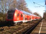 RE 4716 mit Schublok 146 234-0 bei der Durchfahrt Markelfingen 8.2.08