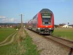 Ein Doppelstockzug unterwegs auf der Rottalbahn am 20.04.2008 mit einem Speisewagen der als Fahrradwagen genutzt wurde.