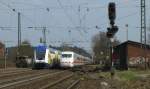 Am 31.03.09 begegnen sich in Radbruch MEr 36522 nach Hamburg Hbf und ICE 771 nach Stuttgart Hbf.