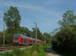 RE 4722 nach Karlsruhe Hbf mit Schublok 146 234 zwischen Markelfingen und Radolfzell.