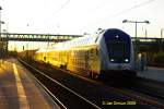 Bucholz in der Nordheide Bahnhof mit einfahrendem Metronom Regional aus Tostedt von den letzten Strahlen der Abendsonne am 14.10.2009 golden angestrahlt.