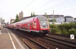 Der RE6 durchfhrt am 29.05.2005 Dsseldorf-Wehrhan mit einem 763.6 Steuerwagen.