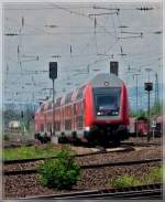 Ein Wendezug nach Koblenz Hauptbahnhof fhrt am 22.05.2011 am DB Museumsgelnde in Koblenz-Ltzel vorbei.