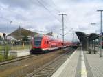 Gleis 1: Steuerwagen der Gattung DBpbzf763 vor dem RE4 in Lutherstadt Wittenberg am 13.07.2004. Am Gleis 2 die 628602.