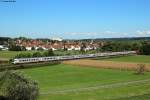 Hier ein 9 Wagen langer IC Richtung Stuttgart in seiner vollen Breite vor der Ortskulisse Heidelsheim, 29.09.2015.