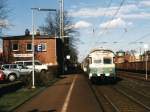141 359-0 mit RB 65  Emsland Express  24119 Emden-Mnster auf Bahnhof Lingen am 9-3-2002. Bild und scan: Date Jan de Vries.