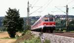 Zur Nachmittagszeit des 05.08.08 ist ein von einer 143 geschobener Regionalzug von Stuttgart nach Geislingen (Steige) bei Uhingen unterwegs.