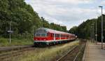 Ein RE nach Kiel Hbf fhrt, geschoben von 218 453-9, am 14.08.2009 in den Bahnhof von Bad Malente-Gremsmhlen ein.