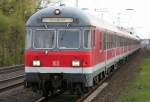 Die 111 016 schiebt ihre RB35 von Dsseldorf nach Emmerich durch Angermund am 16.04.2010