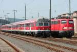 Ein RE1 Verstrker mit Karlsruher und 111 112 & ein RE4 Verstrker mit 110 494-2 stehen bers Wochenende abgestellt in Aachen Rothe Erde am 10.07.2010