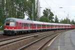 Die 111 128 schiebt den RE9 aus Kln Messe/Deutz nach Aachen durch Eschweiler HBF am 09.08.2010