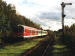 218 247-5 mit RB 10218 Langenberg-Borken auf Bahnhof Rhade am 29-10-2000.