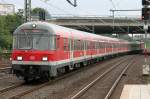 Die 111 156 schiebt ihren RB35 Verstrker von Dsseldorf nach Emmerich in Dsseldorf Flughafen ein am 16.07.2011 