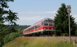 RE 22304 (Neustadt(Schwarzw)-Rottweil) mit Schublok 218 476-0 bei Rtenbach 16.6.12