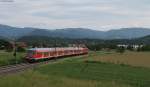 RB 26578 (Freiburg(Breisgau) Hbf-Offenburg) mit Schublok 111 060-0 bei Kollmarsreute 27.5.12