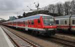 Hier eine RB77 (RB21114) von Neumünster nach Kiel Hbf., bei der Einfahrt am 29.2.2016 in Kiel Hbf. Geschoben hatte die Kieler 112 141-7.