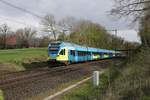 Eurobahn ET 9.03 ist hier mit angehängtem zweiten Zugteil als RB 66 am Ortsrand von Hasbergen am 14.4.2020 um 10.26 Uhr auf dem Weg nach Münster.