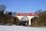 RE 4 Dosto Schlußwagen, aus Aachen nach Dortmund auf einem Viadukt nahe Aachen West bei AC- Laurensberg am 21.1.2017