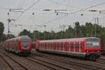 Die S6 nach Kln-Nippes und der RE6 nach Dsseldorf Hbf wurde am 2.7.13 wegen einer Entgleisung in Derendorf bis Dsseldorf Hbf ber die Gterzugstrecke umgeleitet.Hier in Dsseldorf-Rath.