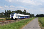 Triebwagen 857 (National Express) als RE7 in Richtung Krefeld Hbf in Kaarst, 20.