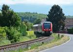 Unten naht der 620 038 RE22 von Bad Münstereifel nach Bonn, oben ist ein Gewitter im Anmarsch.