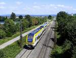 RE 7, auf der Fahrt nach Basel Bad.Bahnhof, rechts der Kirchturm von Denzlingen, Juni 2024