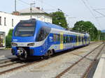 ET 352 (1427 002) des Meridian wartet im Bahnhof Bad Aibling auf die Weiterfahrt nach München Hbf.