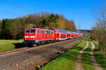 111 214 DB Regio mit RE 4860 (München Hbf - Nürnberg Hbf) bei Postbauer-Heng, 23.04.2021