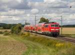 111 224 mit dem RE 4261 nach Mnchen zwischen Beratzhausen und Mausheim am 26.8.2012.