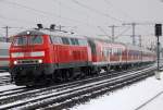 Die 218 471-1 + 218 475-2 als RB von Buchloe nach Mnchen Hbf am Hirschgarten am 15.02.2013