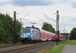 146 246  Bahnland Bayern  zieht am 11.August 2016 einen RE nach Frankfurt(Main)Hbf bei Thngersheim in Richtung Gemnden(Main).