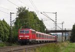 111 182-2 zieht am 11.August 2016 einen RE nach Frankfurt(Main) bei Thngersheim in Richtung Gemnden(Main).