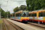 AVG Stadtbahn Triebwagen 559 ist am 14.07.2014 als S11 nach Ittersbach unterwegs und erreicht Ettlingen Stadt.