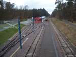 Das kleine Depot der AVG am Endpunkt der Linie S5 kurz nach der S-Bahn Station Wrth Badeepark. Rechter Hand fhrt die DB strecke in Richtung Neustadt.