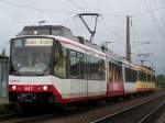 847  RegioBistro  und ein weiterer S-Bahntriebwagen, fuhren am 7.August 2007 als S32 nach Baden-Baden. Aufgenommen im S-Bahn Bahnhof Malsch.