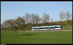 Saarbahnintermezzo bei der AVG. Ein Saarbahnwagen fhrt an der Ortschaft Helmsheim vorbei. Aufgenommen am 09.04.10.